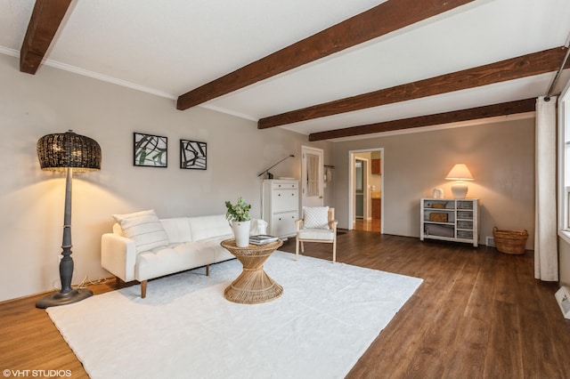 living room with wood-type flooring, crown molding, and beam ceiling