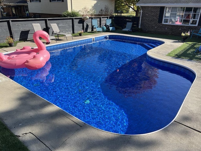 view of pool with a patio