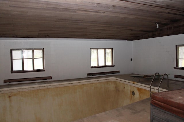 9370 Moon Rd, Saline, MI 48176 - unfurnished living room with vaulted ceiling