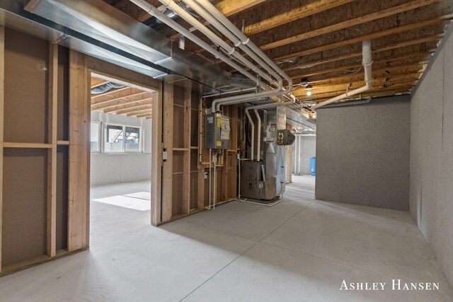 basement featuring heating unit