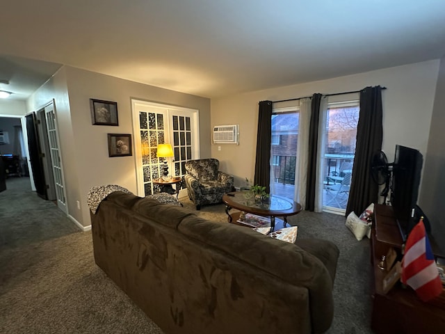 living room featuring dark colored carpet and an AC wall unit