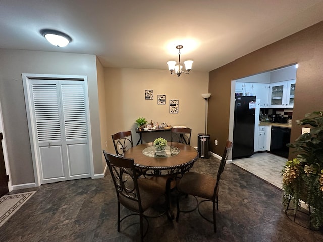 dining room with a chandelier