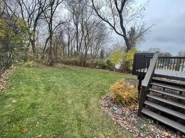 view of yard with a wooden deck