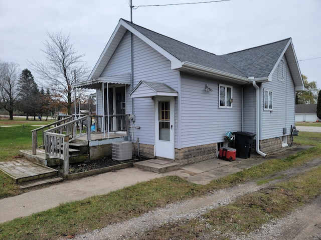 view of front of house featuring central AC unit