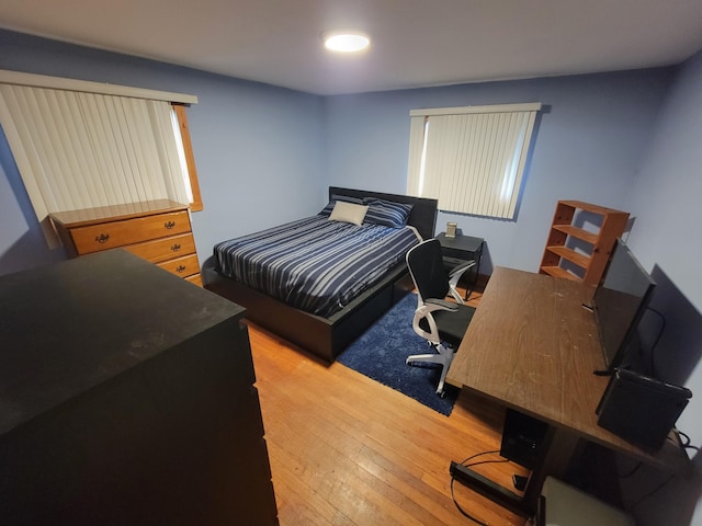 bedroom featuring light wood-type flooring