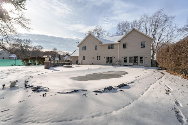 view of snow covered property