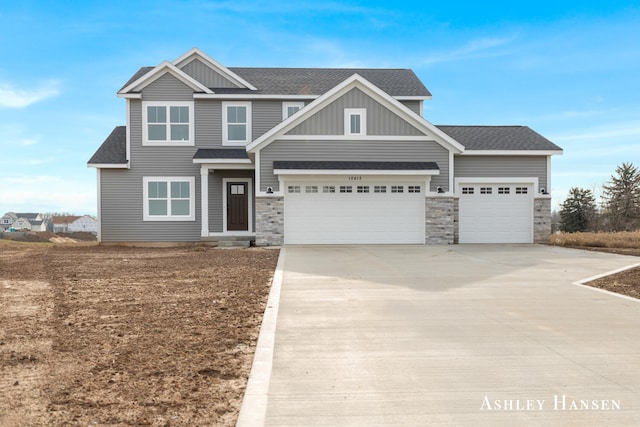 craftsman house featuring a garage