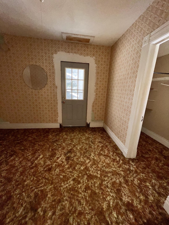 interior space with a textured ceiling