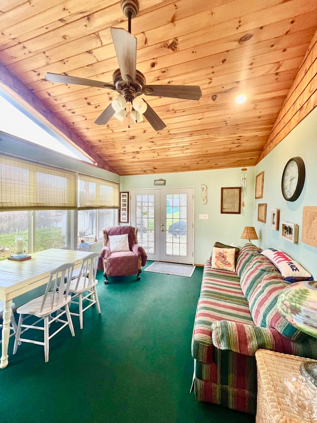 interior space featuring french doors, vaulted ceiling, ceiling fan, carpet floors, and wood ceiling