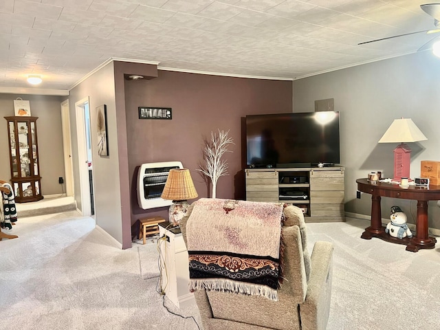 carpeted living room with ornamental molding and heating unit