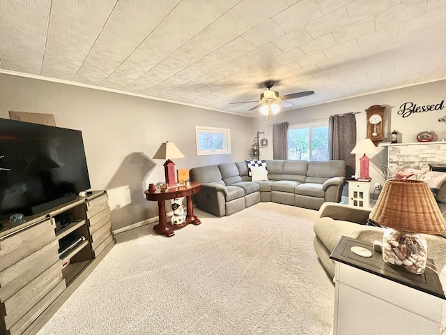 living room with light carpet, ceiling fan, and ornamental molding