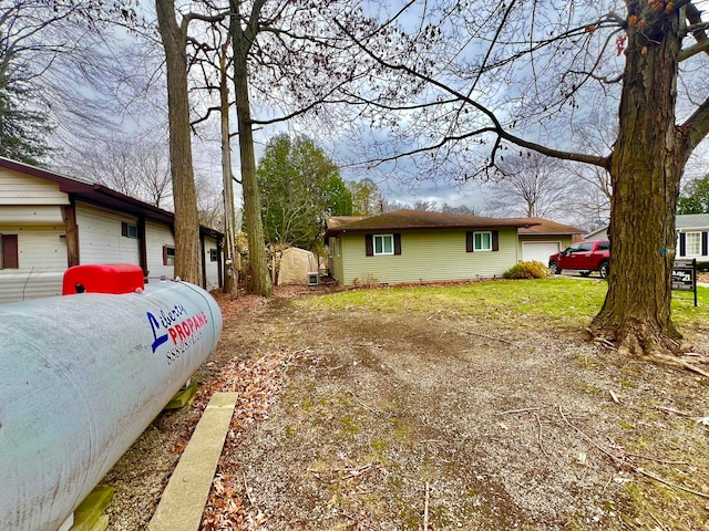 view of home's exterior with a garage