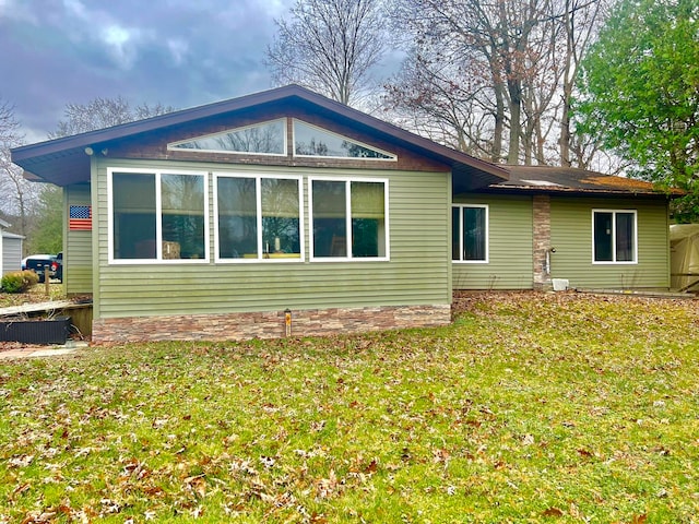 back of house with a yard