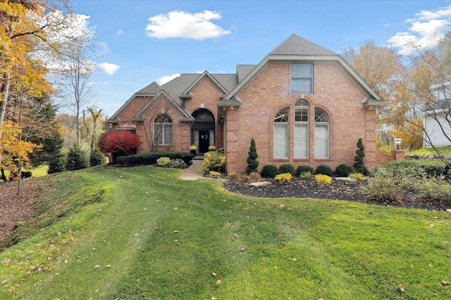 view of front of home with a front yard