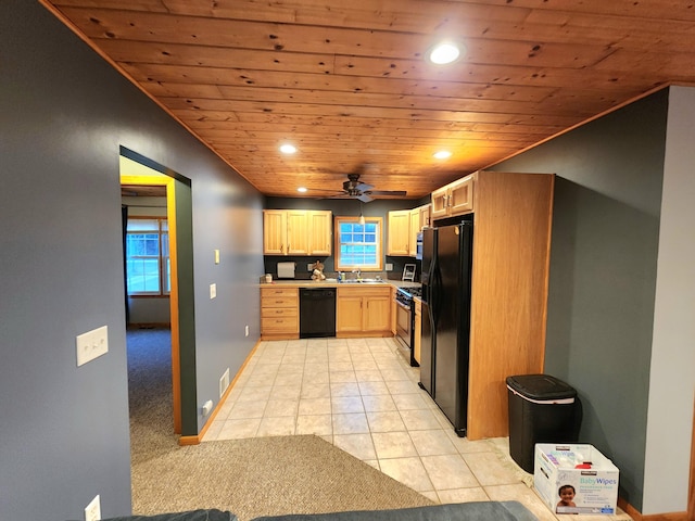 kitchen with light brown cabinetry, wooden ceiling, plenty of natural light, and black appliances