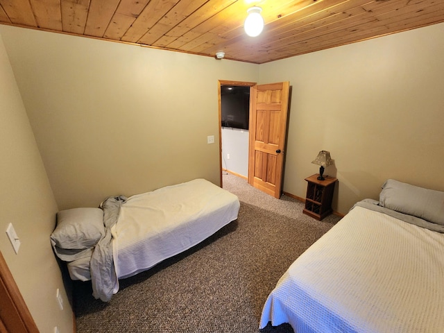 bedroom featuring dark carpet and wood ceiling