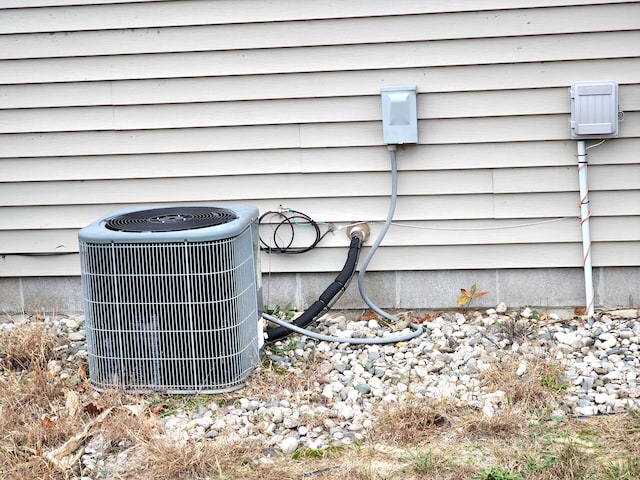 exterior details with central air condition unit