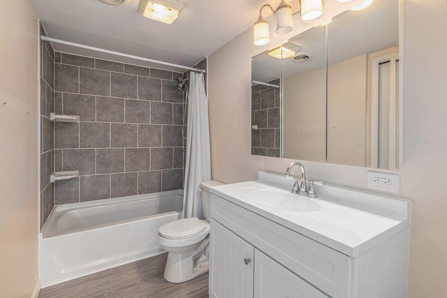 full bathroom with shower / bath combo with shower curtain, toilet, wood-type flooring, and vanity