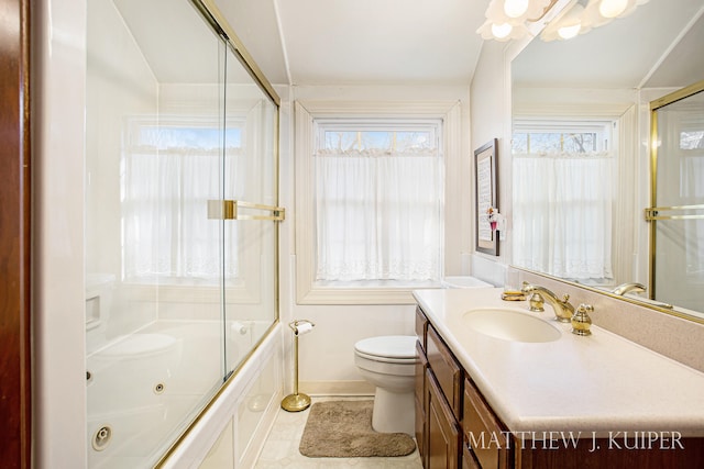 full bathroom with tile patterned flooring, vanity, toilet, and bath / shower combo with glass door