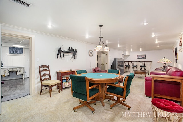 recreation room featuring light carpet and crown molding