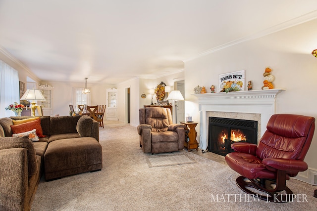 living room with crown molding and carpet floors