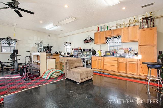 garage featuring ceiling fan