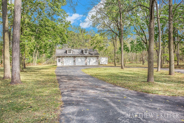 view of front of property with a front lawn