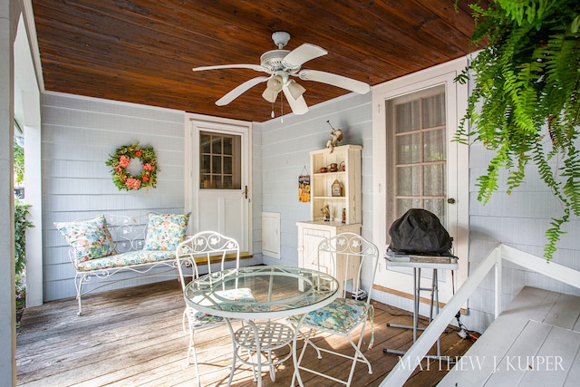 wooden deck with ceiling fan