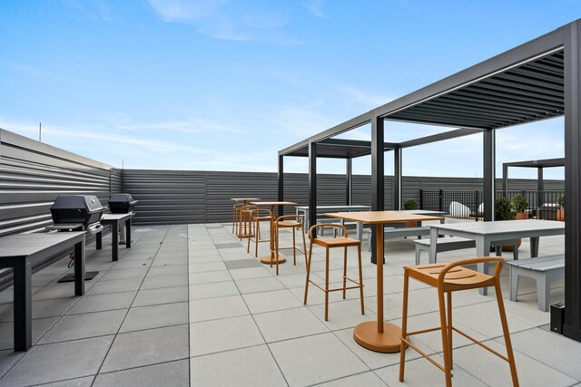 view of patio with a grill