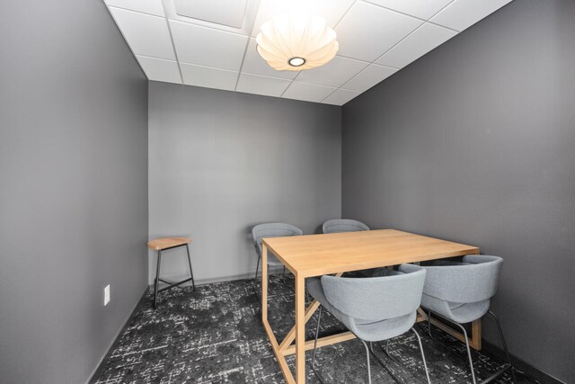 home office featuring a paneled ceiling