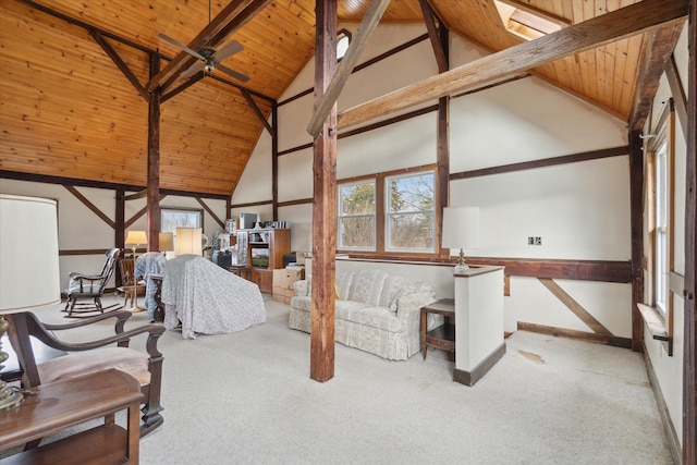 carpeted bedroom with beam ceiling, high vaulted ceiling, and wooden ceiling