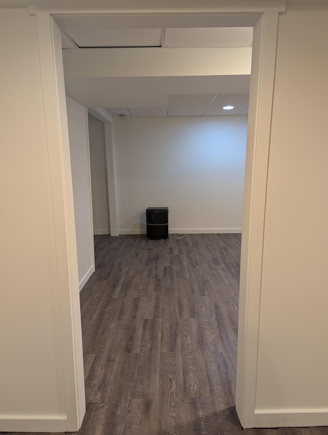 corridor with dark hardwood / wood-style floors