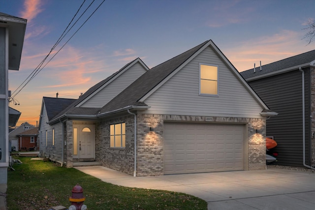 front of property with a garage