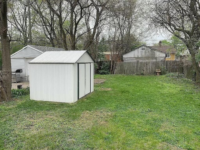 view of outdoor structure with a lawn