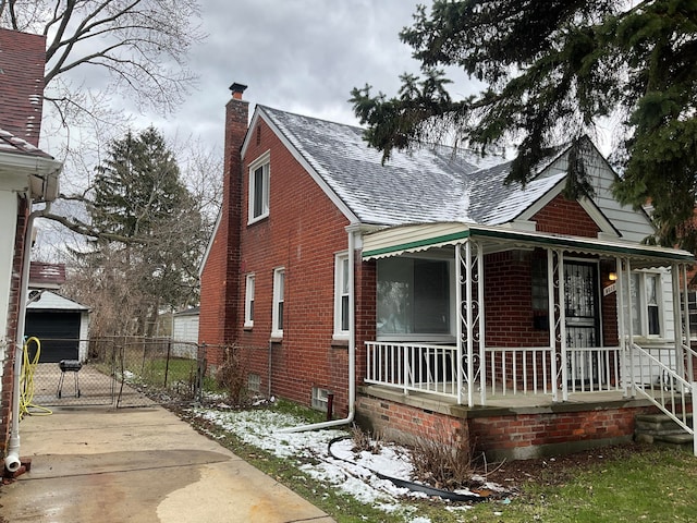 bungalow-style home featuring a porch