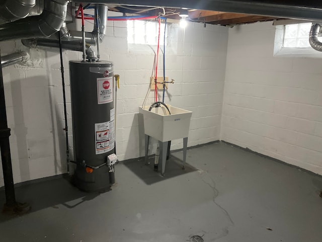 basement featuring gas water heater