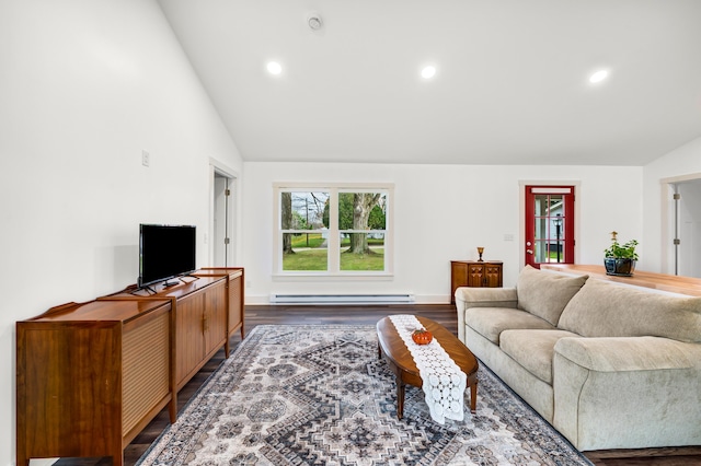 living room featuring vaulted ceiling, baseboard heating, and dark wood-type flooring