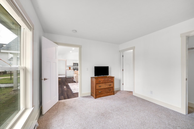 unfurnished bedroom featuring carpet flooring