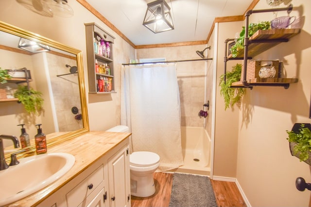 bathroom featuring vanity, toilet, a shower with shower curtain, and hardwood / wood-style flooring