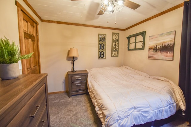 bedroom with dark colored carpet, ceiling fan, and crown molding