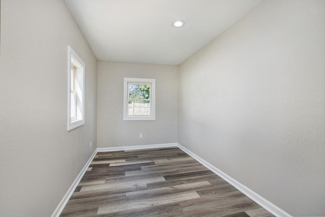 empty room featuring dark hardwood / wood-style floors