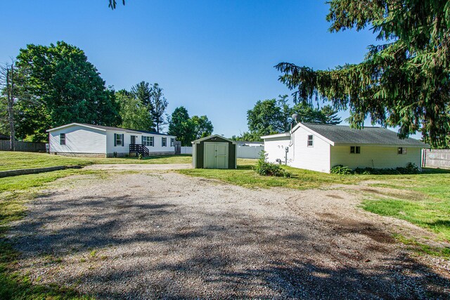 exterior space featuring a storage unit