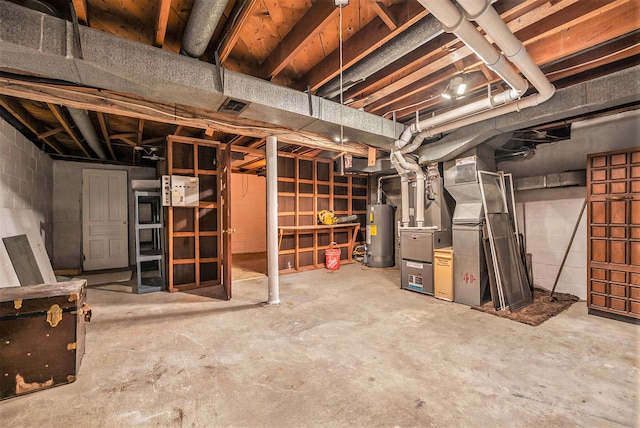 basement with heating unit and water heater