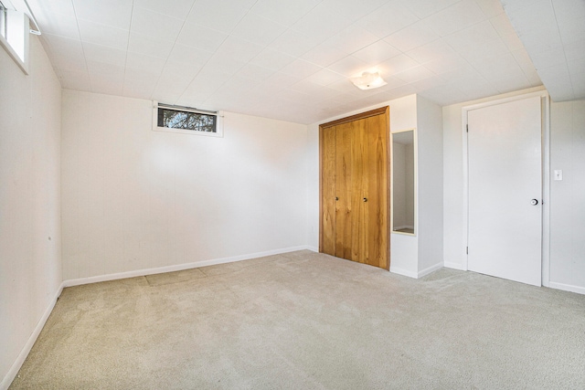 basement with light carpet