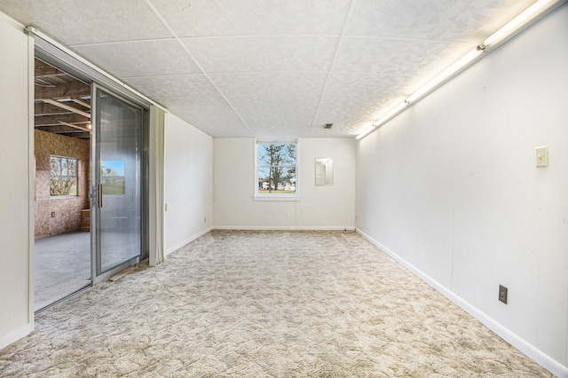 empty room with carpet flooring