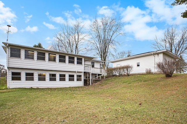 back of house with a yard