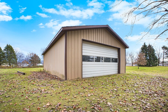 garage with a yard