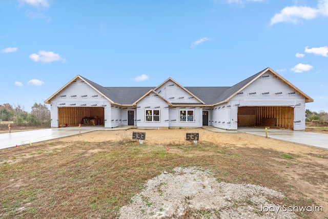 property in mid-construction with a garage