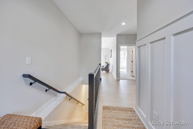 stairway featuring hardwood / wood-style floors