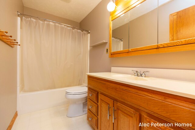 full bathroom featuring vanity, toilet, and shower / bath combo with shower curtain